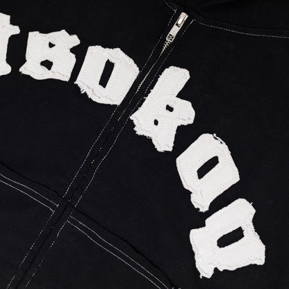 Black hoodie with white text on a black background